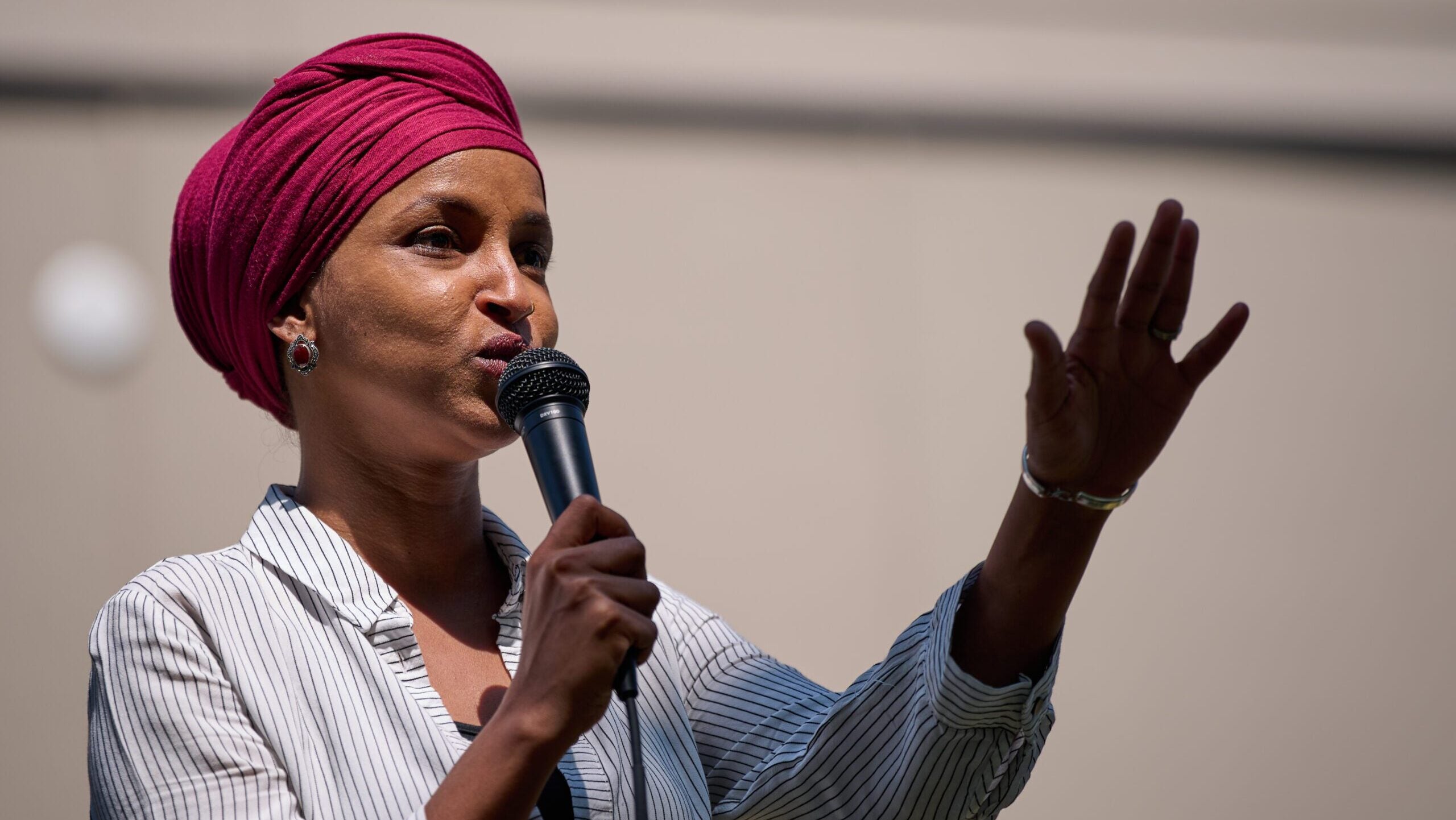 DOJ seeks to keep search warrant records for Rep. Ilhan Omar sealed amidst ongoing investigation.